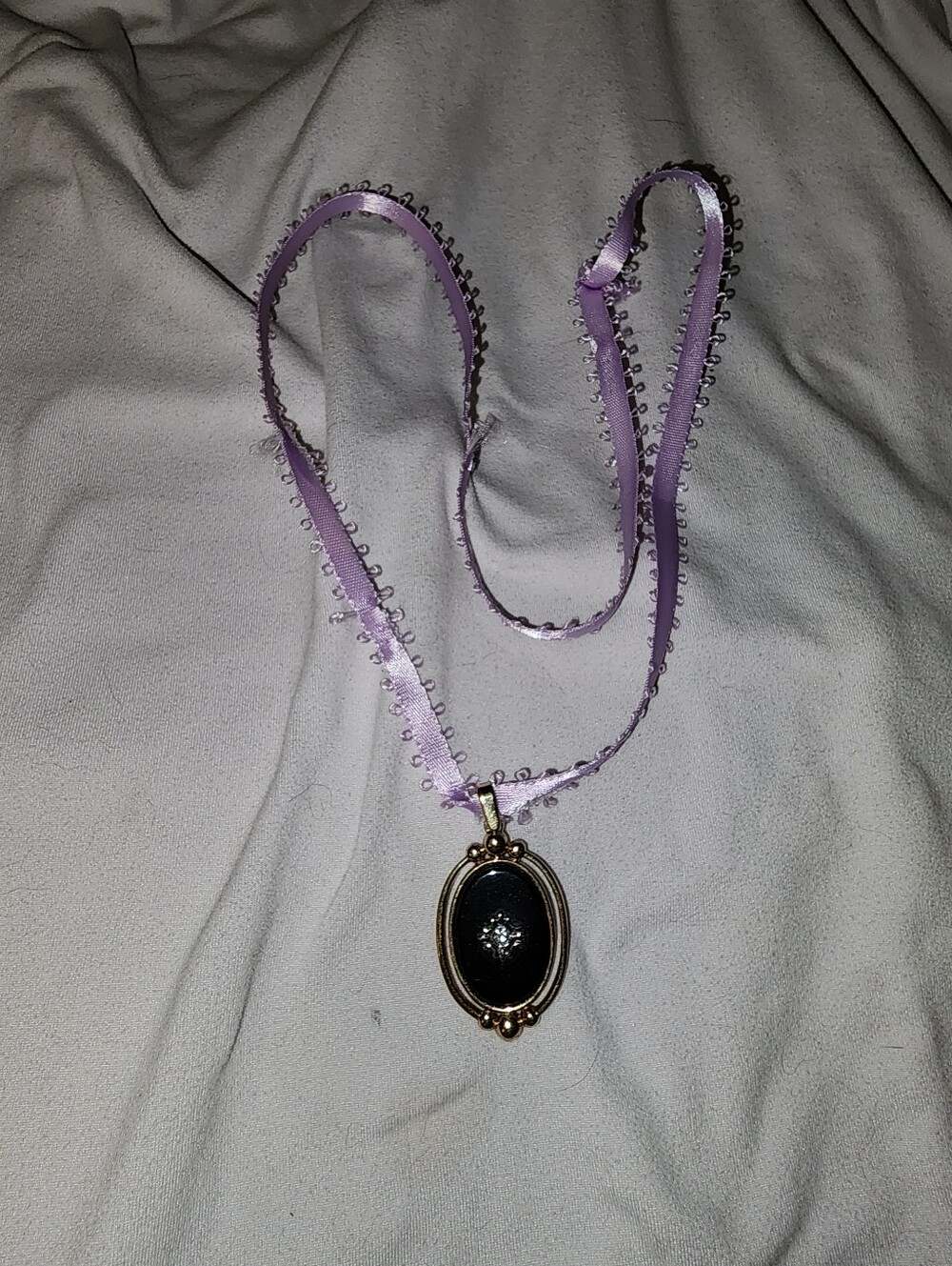 Avon Lilac Ribbon Necklace with Black Oval Pendant